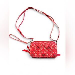Red Vera Bradley wristlet wallet with heart design and removable strap